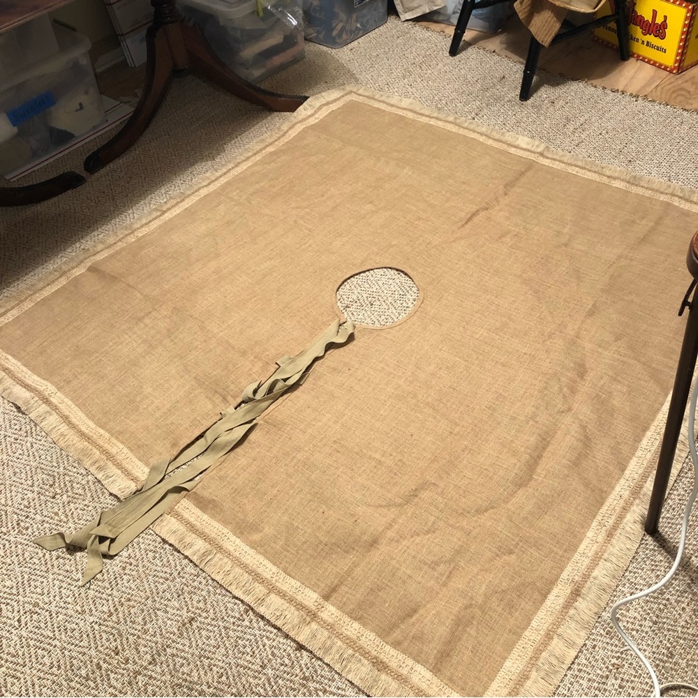 A burlap tree skirt with ties and fringe by soft surroundings